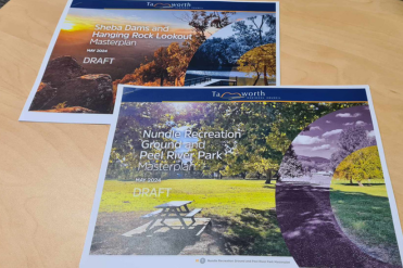 Image of front covers of the two draft masterplans