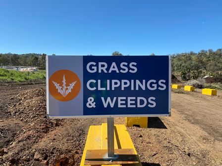 Grass Clippings and Weeds sign