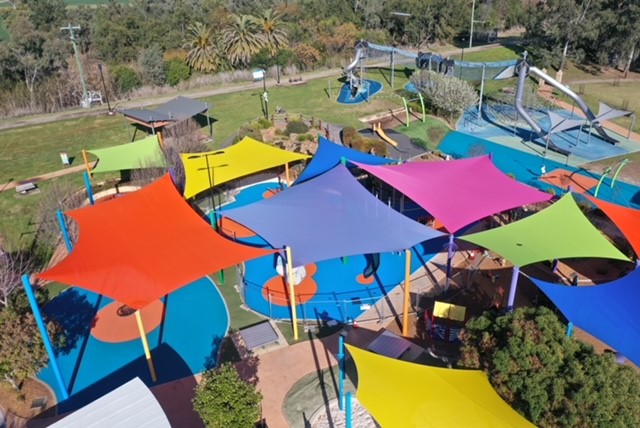 Drone image of new blue and orange soft fall installed at Tamworth Regional Playground. 