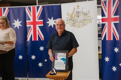 Kenneth Hall, winner of Tamworth Citizen of the Year standing with his framed award as he received it