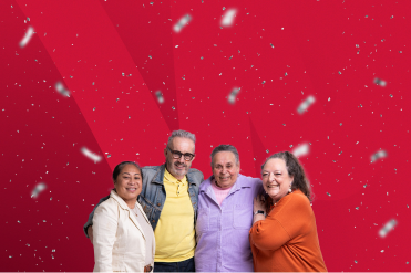 red background with sprinkles, and four people aged over 50 years