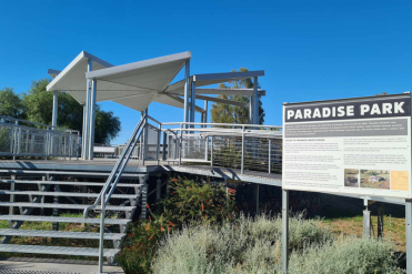 Paradise Pump Structure and Paradise Park sign in foreground